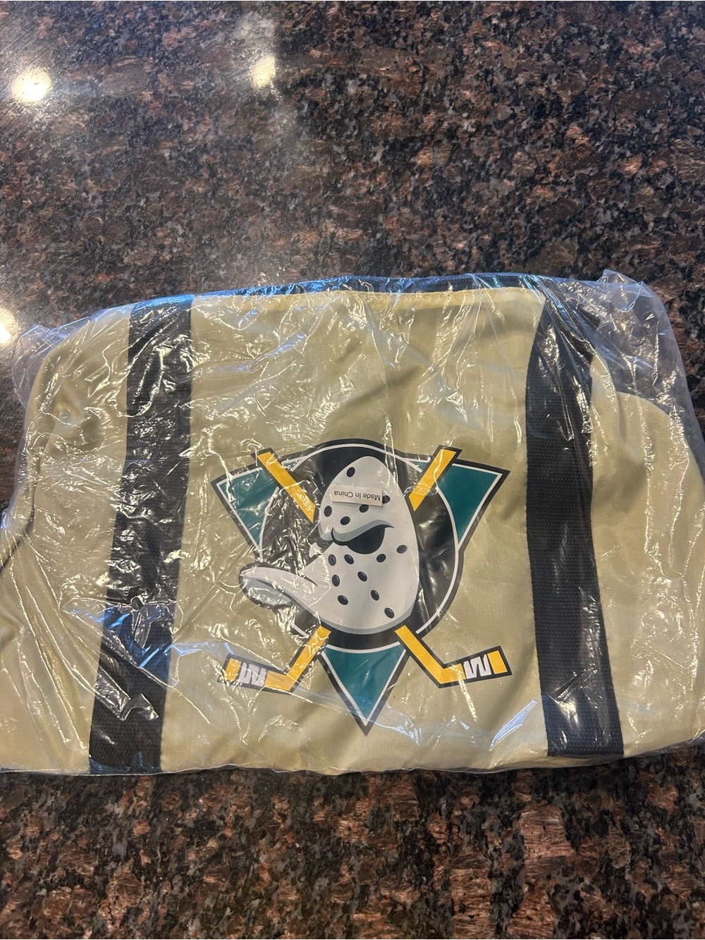 Neutral/Tan Hockey Logo Duffle Bag with Black Straps
